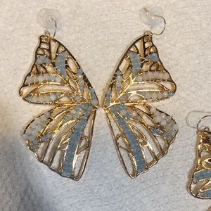 Genuine jade and aquamarine gemstones on a butterfly wing earrings.